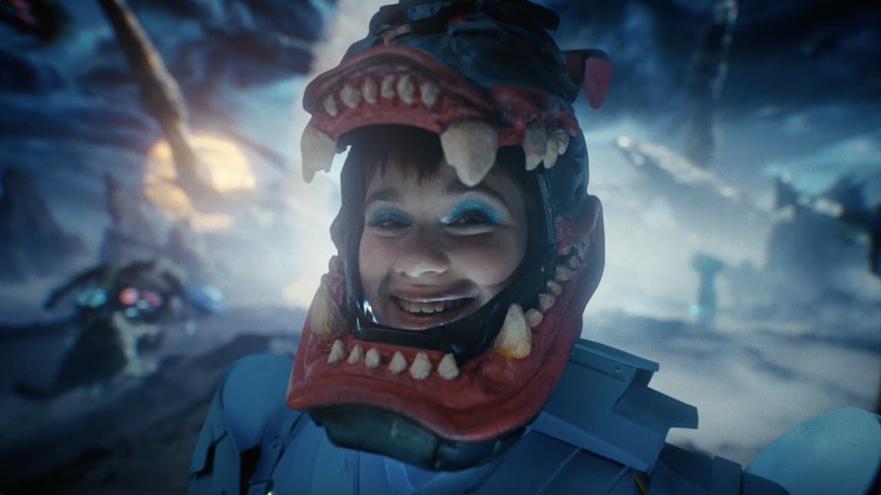 Video thumbnail of a girl wearing a dragon helmet in a sci-fi landscape